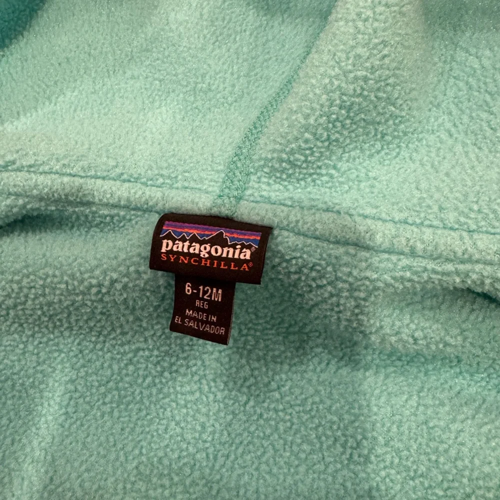 Patagonia Kids Teal/Turquoise Fleece Jacket with Pink Trim